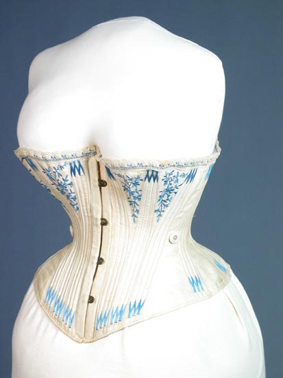 Corset with blue flowers.